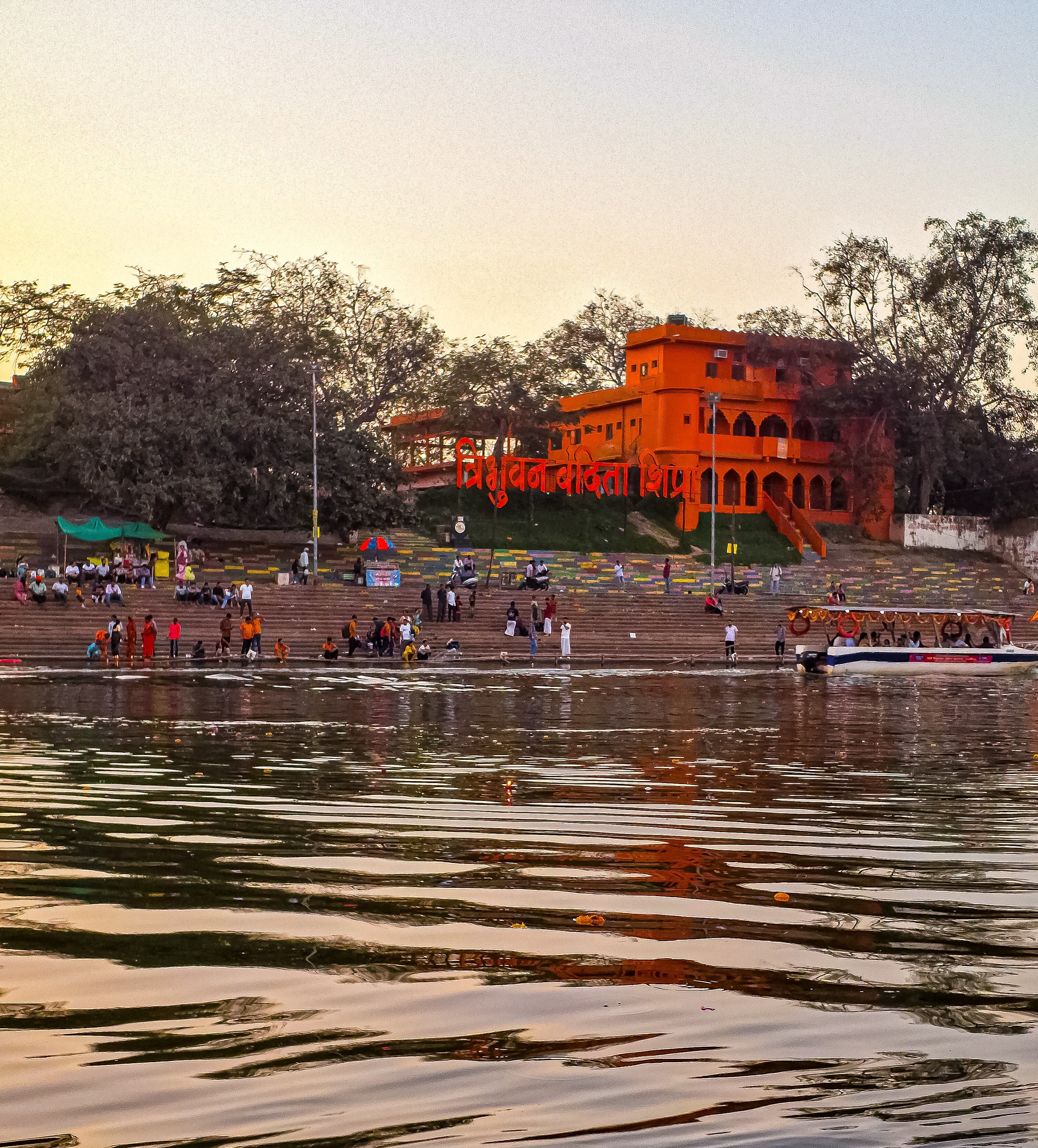 Historic Ram Ghat on the holy Shipra River during evening aarti in Ujjain